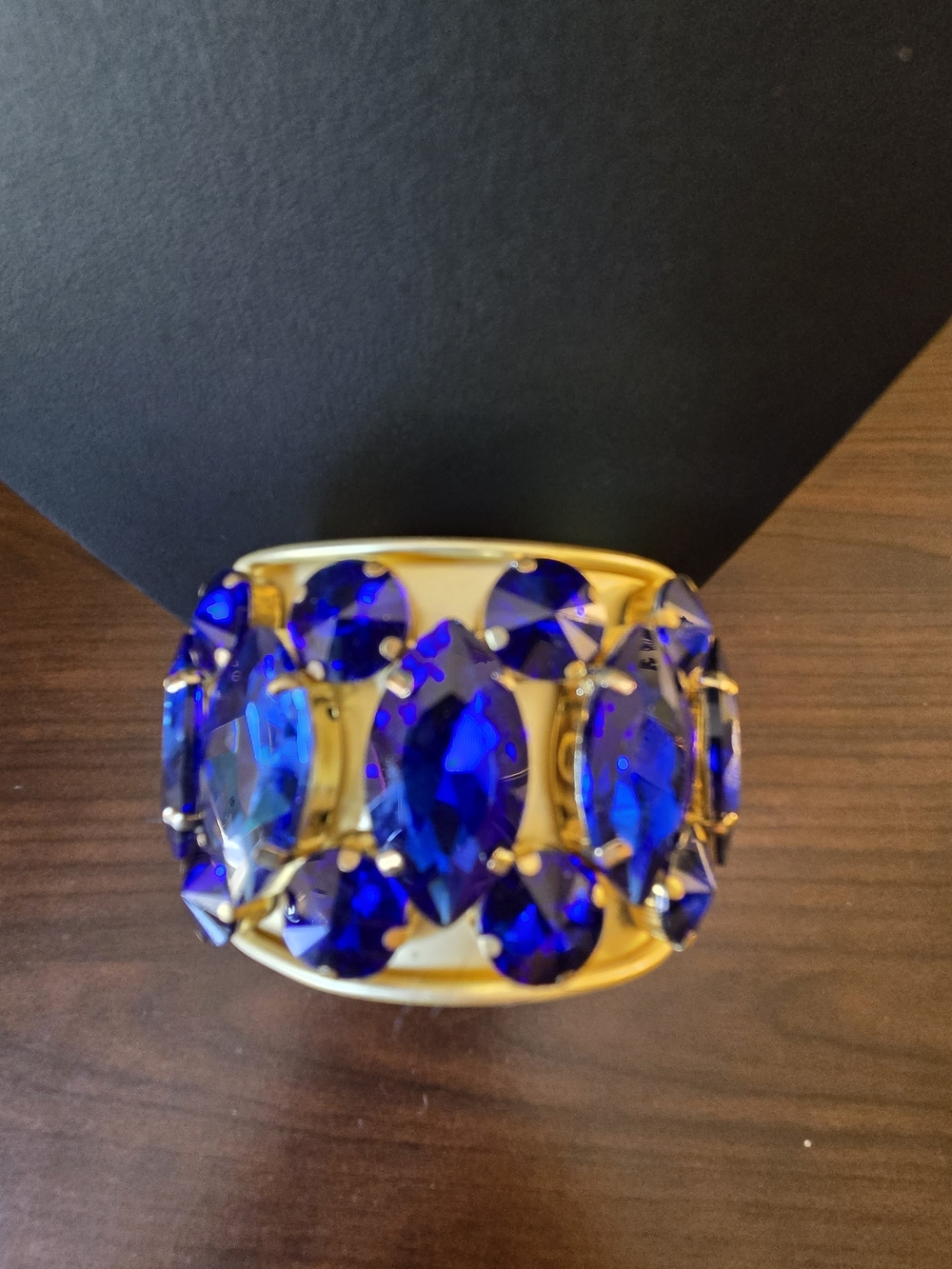 Gold Cuff Bracelet with Deep Sapphire Blue Faceted Stones